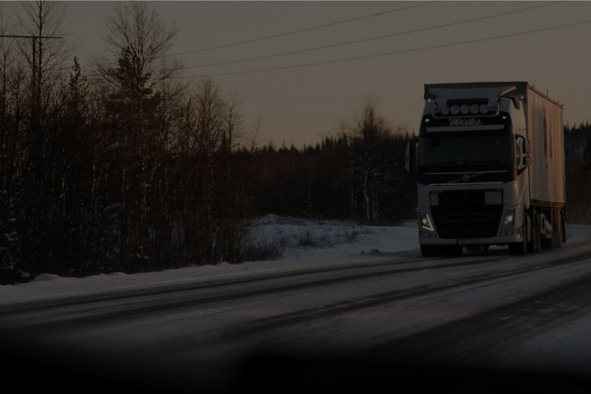 Winter forest with truck